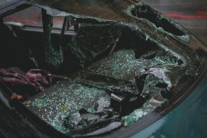 car's rear window with shattered glass
